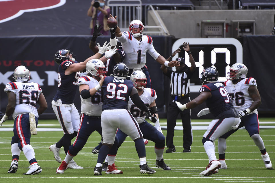 New England Patriots quarterback Cam Newton (1) bats down the ball after his pass was deflected during the second half of an NFL football game against the Houston Texans, Sunday, Nov. 22, 2020, in Houston. (AP Photo/Eric Christian Smith)