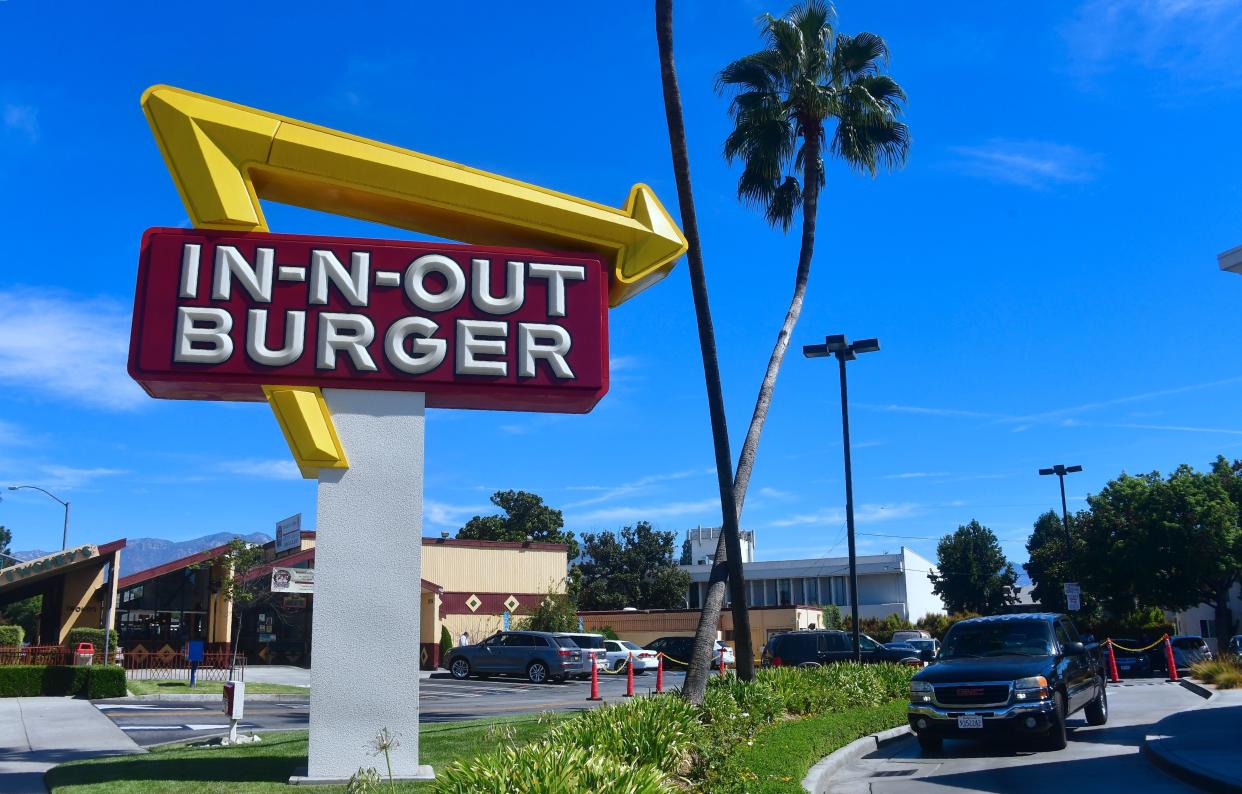 A driver pulls into the drive-thru lane at an In-N-Out Burger restaurant in Alhambra, California on August 30, 2018. - Califoria's Democratic Party Chairman, Eric Bauman, is calling for a boycott of the Irvine, CA based fast food chain after it donated $25,000 to help California Republicans in November. In addition to this week's donation, In-N-Out donated $30,000 to the GOP in 2017 and 2016. (Photo by Frederic J. BROWN / AFP)        (Photo credit should read FREDERIC J. BROWN/AFP/Getty Images)