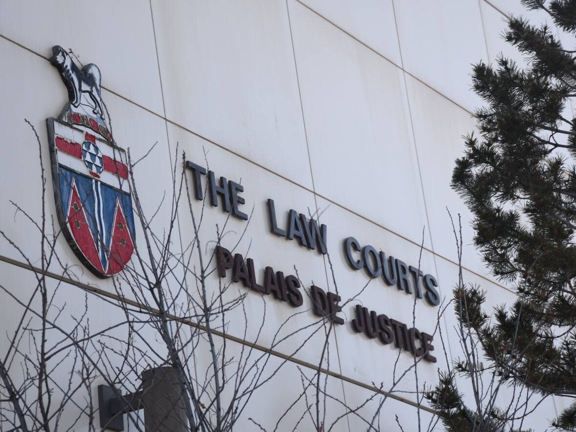 A close-up of the signage on the courthouse in Whitehorse. Nine new affidavits filed with the Supreme Court of Yukon contain allegations that paint an even darker picture of the use of holds and seclusion at Jack Hulland Elementary School in Whitehorse.  (Jackie Hong/CBC  - image credit)