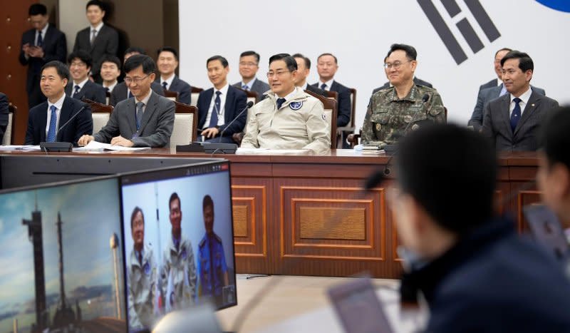 South Korean Defense Minister Shin Won-sik watches a simulcast of the launch at ministry headquarters Monday. Photo courtesy of Republic of Korea Defense Ministry