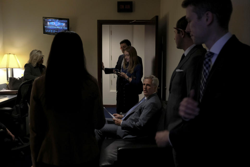 House Minority Leader Kevin McCarthy (R-Calif.) reads over his notes with other GOP leaders before a press conference denouncing the vote on the articles of impeachment at the Capitol in Washington, D.C., on Dec. 17, 2019. | Gabriella Demczuk for TIME