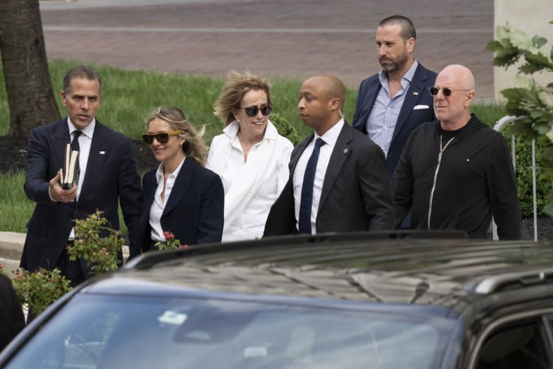 Hunter Biden (L) departs with his wife Melissa from Wilmington's J. Caleb Boggs Federal Building with and his aunt, Valerie Biden Owens (C), on the fourth day of the federal gun trial in Delaware just south of Philadelphia. Photo by Ken Cedeno/UPI