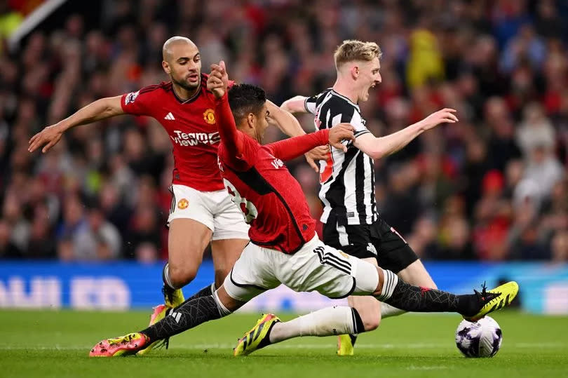 Anthony Gordon is brought down during Manchester United vs Newcastle