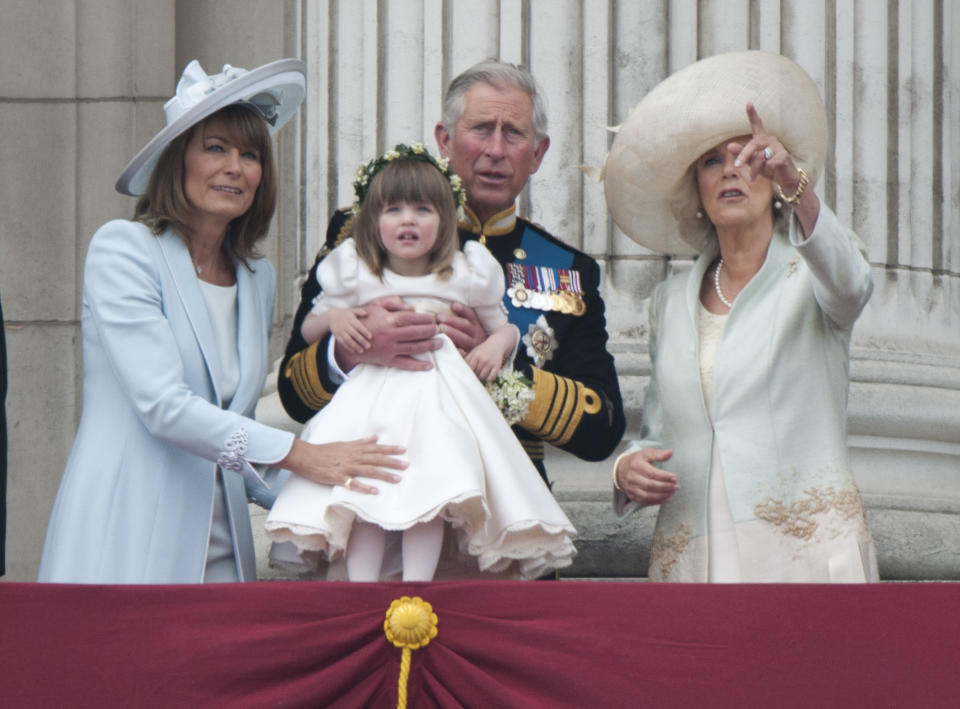 (Left-Right) Carole Middleton, Prince Charles, Holding Bridesmaid Eliza Lopes And The Duchess Of Cornwall, On The Balcony Of Buckingham Palace, London, Following The Wedding Of Prince William And Kate Middleton At Westminster Abbey. (Photo by Antony Jones/Julian Parker/Mark Cuthbert/UK Press via Getty Images)