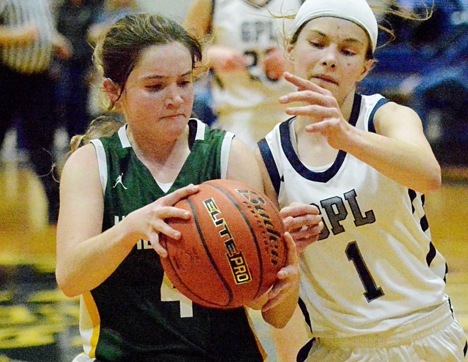 Great Plains Lutheran's Halle Bauer (1) defends against Northwestern's Tara Blachford during a high school basketball doubleheader on Thursday, Feb. 9, 2023 in Watertown.