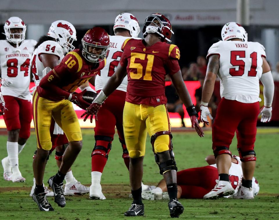 USC defensive lineman Solomon Byrd celebrates after recovering a fumble by Fresno State quarterback Jake Haener.