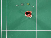 <p>Yuta Watanabe (left) and Arisa Higashino of Japan celebrate after winning the mix doubles bronze medal badminton match on day seven of the Games.</p>