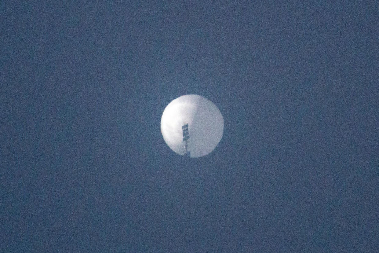 A balloon in the sky over Billings, Mont., in images taken Feb. 1. The Pentagon said Thursday that a suspected Chinese spy balloon was hovering over the area. (Chase Doak / AFP - Getty Images)