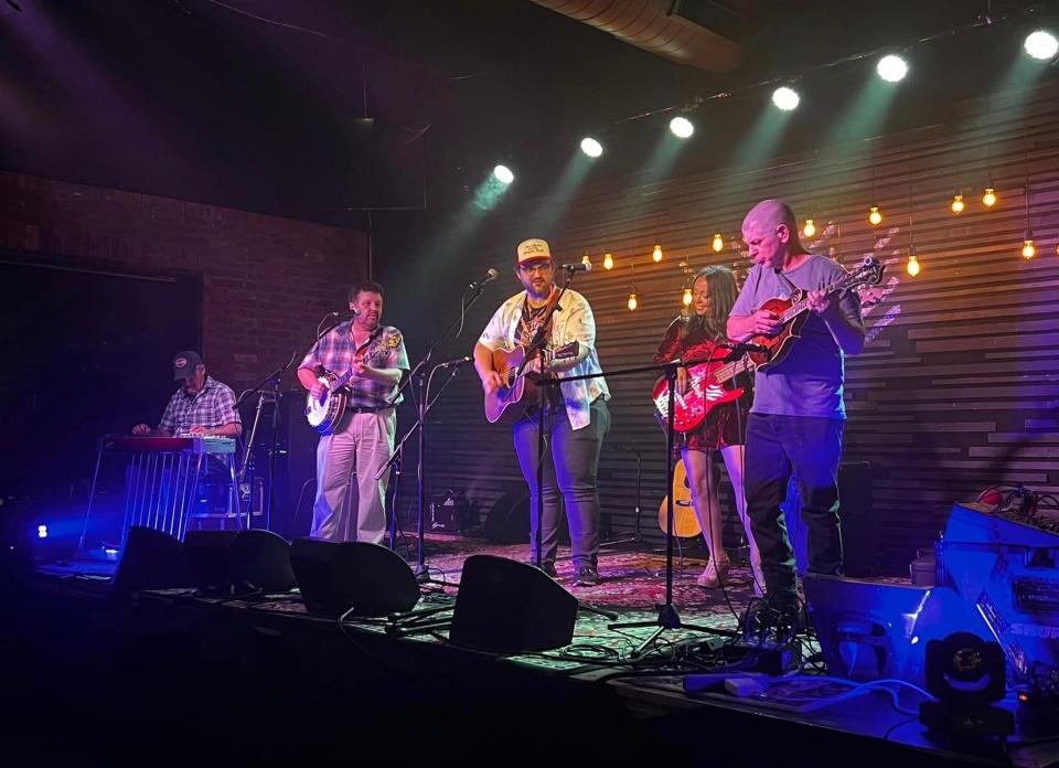 Jesse Manns and the Bluegrass Band is pictured.
