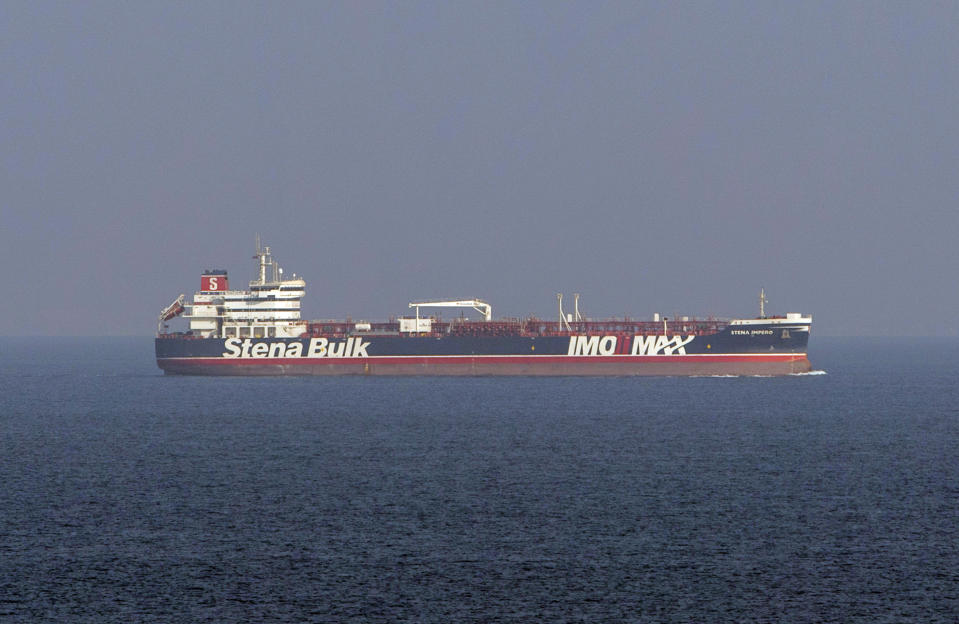 In this image taken from aboard a Royal Navy Wildcat helicopter patrolling the Gulf as part of the International Maritime Security Construct, shows the MV Stena Impero as it sails from the port at Bandar Abbas, Iran, after being released by Iranian officials Friday Sept. 27, 2019. Iran on Friday released the British-flagged oil tanker it had seized in July 2019, while the country’s president, returning from an annual United Nations meeting, said he had been told the United States had offered to lift sanctions if Tehran returned to the negotiating table over its nuclear program. (Dan Rosenbaum/British Royal Navy via AP)