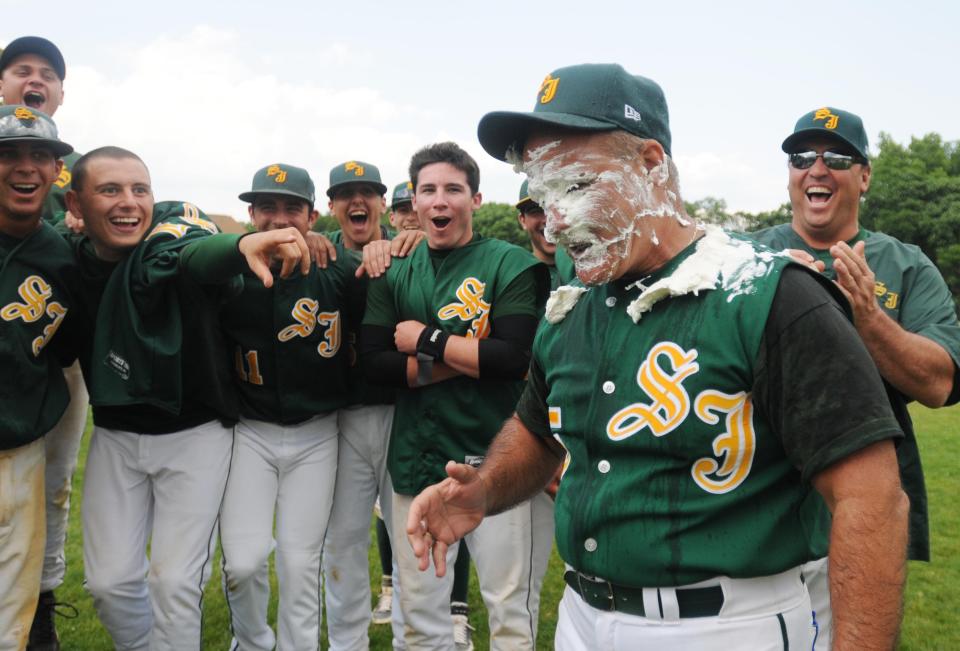 Demarest, N.J. -- 5/31/2009 -- St. Joseph baseball coach Frank Salvano got a pie in the face after the team took the Bergen County baseball championship over Ramapo at Northern Valley/Demarest on Sunday. TYSON TRISH/STAFF PHOTOGRAPHER