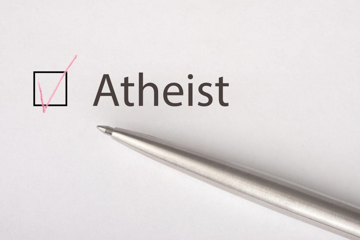 Politicians all over the spectrum have long tried to appeal to religious voters. What about atheists, agnostics and nothing-in-particulars? <a href="https://www.gettyimages.com/detail/photo/atheist-checkbox-on-white-paper-with-metal-pen-royalty-free-image/1137047566?phrase=atheist+voter&adppopup=true" rel="nofollow noopener" target="_blank" data-ylk="slk:Y.Gurevich/iStock via Getty Images Plus;elm:context_link;itc:0;sec:content-canvas" class="link ">Y.Gurevich/iStock via Getty Images Plus</a>