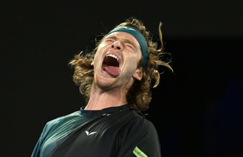 Russian tennis player Andrey Rublev reacts during his 4th round match against Australia's Alex de Minaur on Day 8 of the 2024 Australian Open at Melbourne Park. Lukas Coch/AAP/dpa