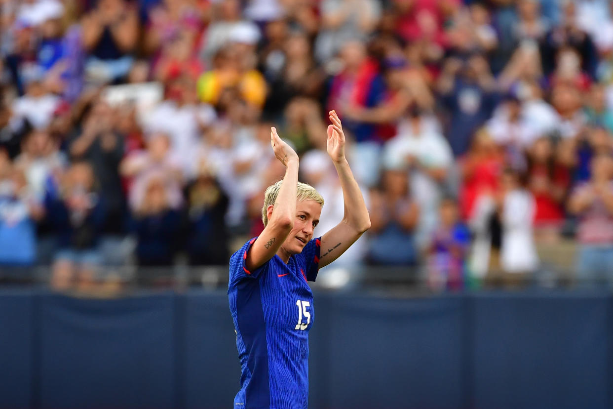 CHICAGO, ILLINOIS - SEPTEMBER 24: Megan Rapinoe #15 of the United States salutes the fans as she is subbed out during the second half against South Africa at Soldier Field on September 24, 2023 in Chicago, Illinois. (Photo by Jane Gershovich/ISI Photos/USSF/Getty Images for USSF)