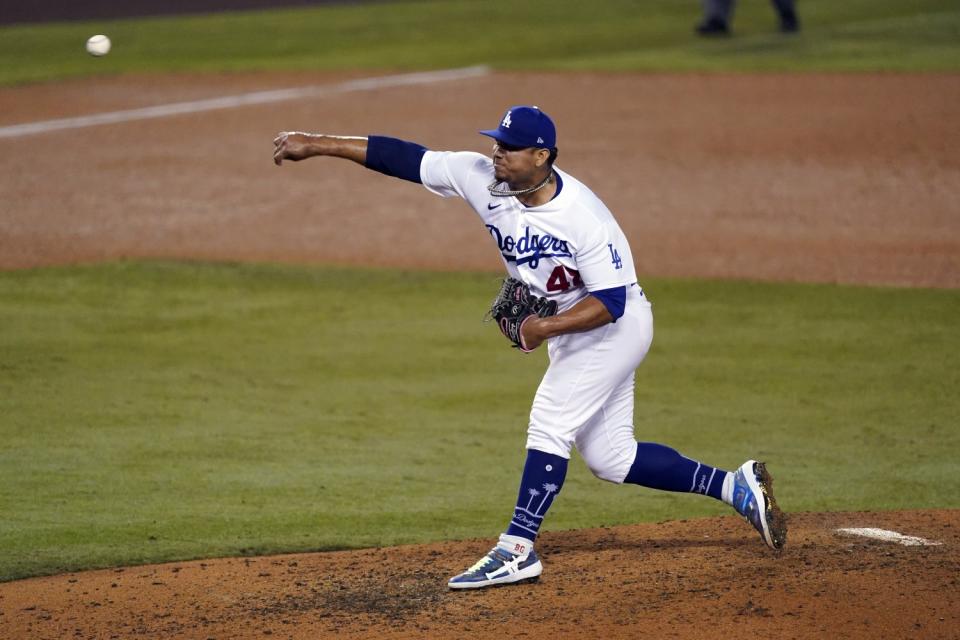 Los Angeles Dodgers relief pitcher Brusdar Graterol throws to the Milwaukee Brewers.