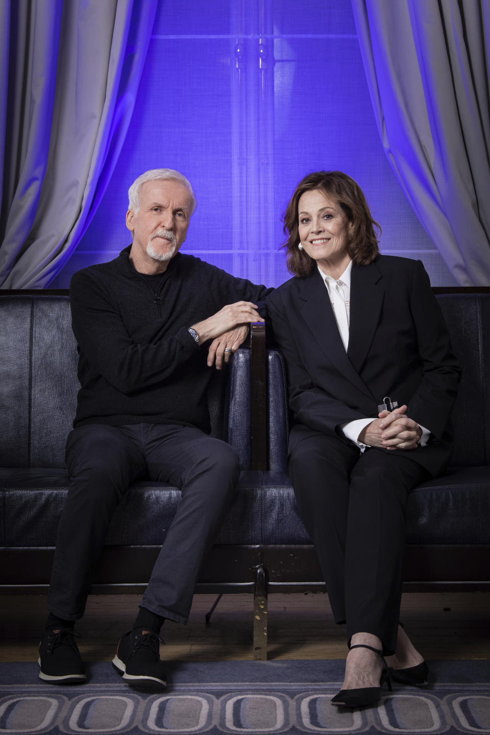 Director James Cameron, left, and Sigourney Weaver pose for a photo to promote the film "Avatar: The Way of Water" in London, Sunday, Dec. 4, 2022. (Photo by Vianney Le Caer/Invision/AP)