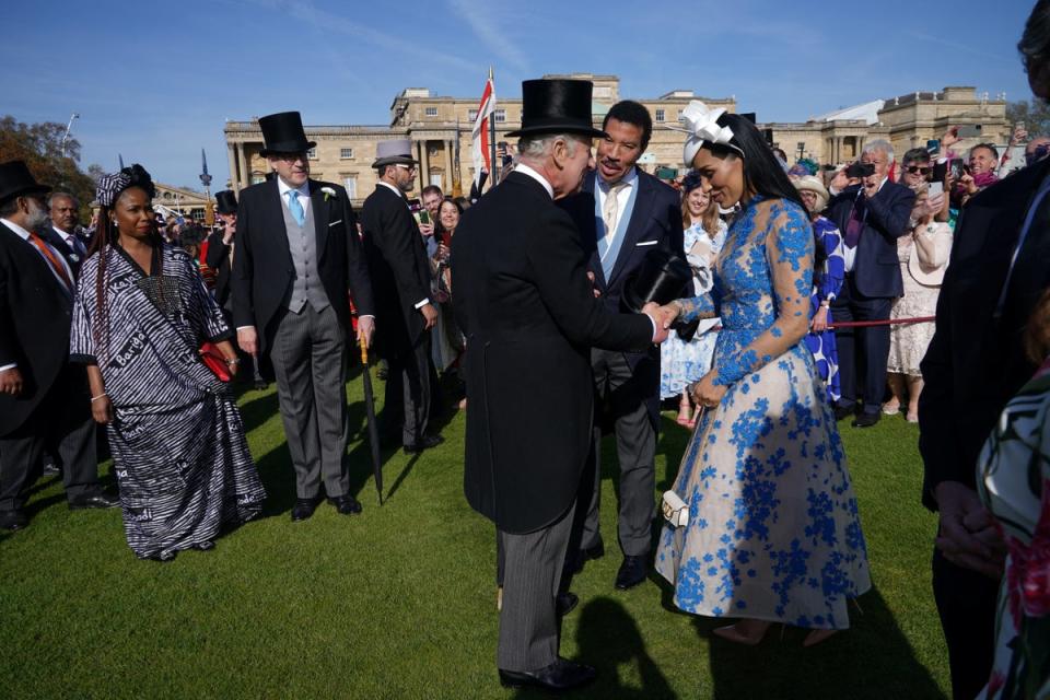 Lionel Richie and Lisa Parigi meet Charles (REUTERS)