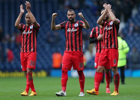 QPR's Sandro celebrates with team mates at the end of the match Reuters / Alex Morton