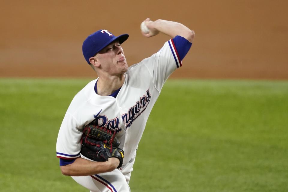 Texas Rangers starting pitcher Kolby Allard throws to the Los Angeles Angels in the third inning of a baseball game in Arlington, Texas, Wednesday, Aug. 4, 2021. (AP Photo/Tony Gutierrez)