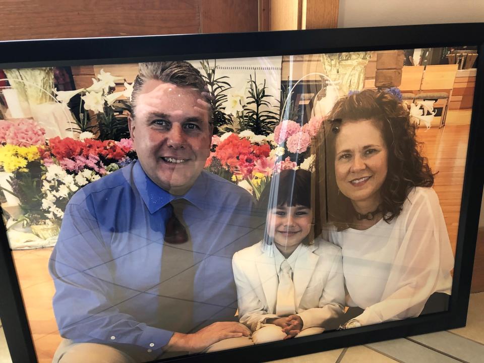 This photo of Tim, Tessa and Karen Thompson was displayed at the 2019 memorial service for the family at St. Susanna Church in Mason.