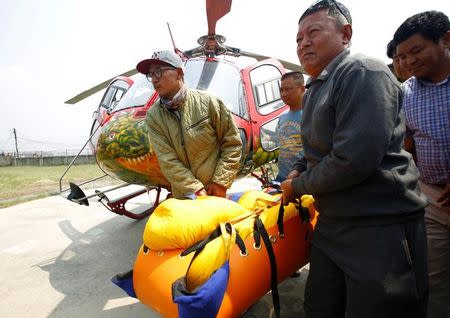 The body of Nepali mountain climber Min Bahadur Sherchan, 85, arrives at a hospital after he died on Saturday, at base camp while on his attempt to become the oldest person to climb Mount Everest, in Kathmandu, Nepal May 7, 2017. REUTERS/Navesh Chitrakar