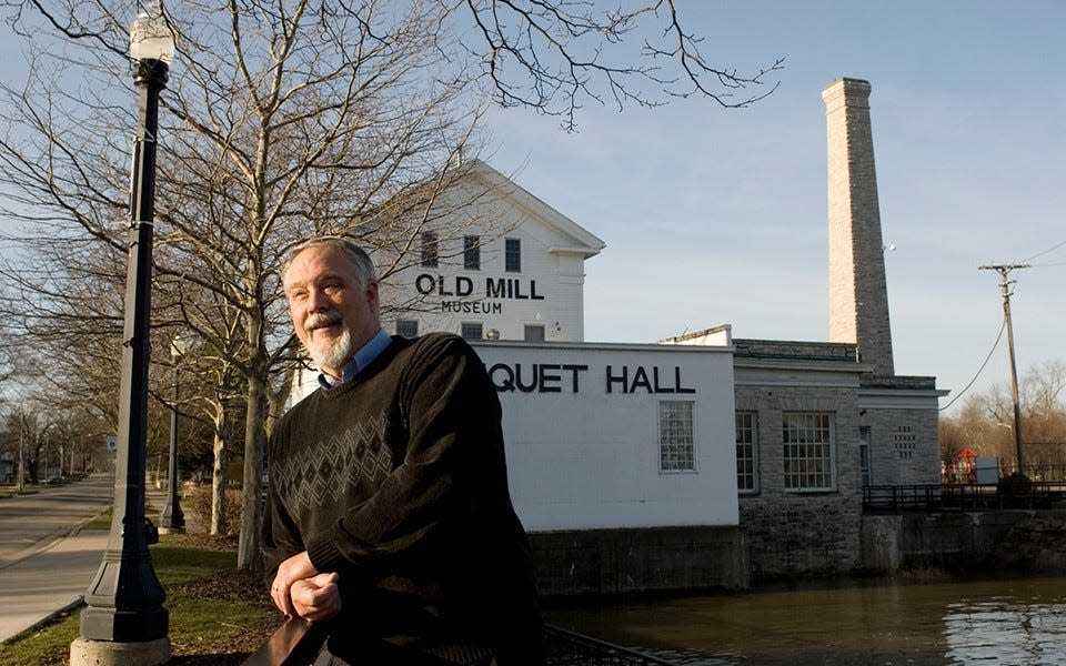 Ted Ligibel is shown in front of Dundee's Old Mill Museum. Ligibel and Jeffrey Green will speak about researching historic homes April 30.