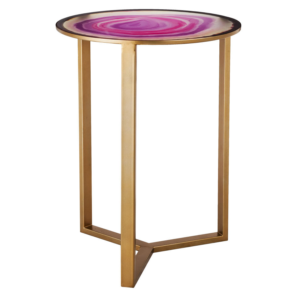 This undated photo provided by Target shows a glass top in a faux agate finish that creates a slim, sleek and interesting side table. (AP Photo/Target)