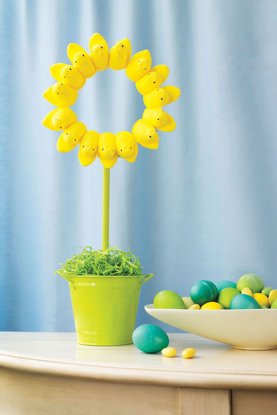<p>Celebrate Easter and the arrival of spring with a cute and sweet DIY project. </p><p><strong><em><a href="https://www.womansday.com/home/crafts-projects/how-to/g238/easter-craft-how-to-peeps-sunflower-116413/" rel="nofollow noopener" target="_blank" data-ylk="slk:Get the Peeps Sunflower tutorial.;elm:context_link;itc:0;sec:content-canvas" class="link ">Get the Peeps Sunflower tutorial.</a></em></strong></p><p><strong><a class="link " href="https://www.amazon.com/Marshmallow-Peeps-Yellow-Chicks-Tray/dp/B00BA0BJOA?tag=syn-yahoo-20&ascsubtag=%5Bartid%7C10070.g.1751%5Bsrc%7Cyahoo-us" rel="nofollow noopener" target="_blank" data-ylk="slk:SHOP PEEPS;elm:context_link;itc:0;sec:content-canvas">SHOP PEEPS</a></strong></p>