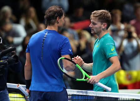 Tennis - ATP World Tour Finals - The O2 Arena, London, Britain - November 13, 2017 Spain's Rafael Nadal shakes the hands of Belgium's David Goffin after their group stage match REUTERS/Hannah McKay