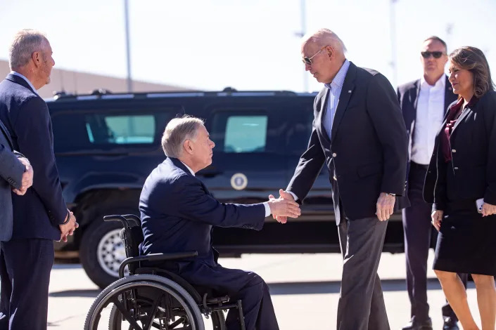 President Joe Biden exchanges handshakes with Texas Gov. Greg Abbott when the president arrived in El Paso Jan. 8, 2023 to assess border enforcement operations and meet with community leaders coping with a historic number of migrants fleeing political oppression and gang violence in Venezuela, Haiti, Nicaragua, and Cuba. U.S. Rep. Veronica Escobar, D-El Paso, accompanied the president on the flight to her hometown.