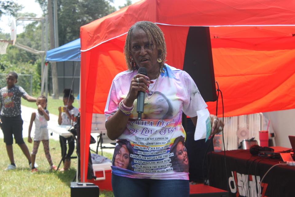 Twila Robinson-Browder's mother, Felicia Carnegie-Parker, welcomed the audience to the Twila Love Fest at T.B. McPherson Park on Saturday (Aug. 26, 2023.)