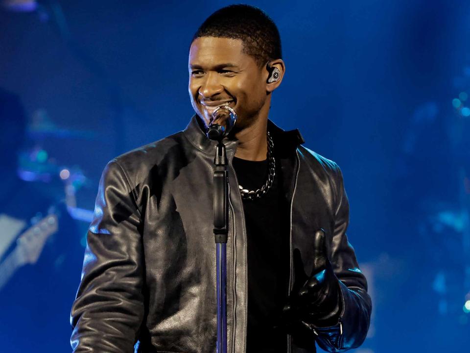 <p>Kevin Winter/Getty</p> Usher performs onstage during a taping of iHeartRadio
