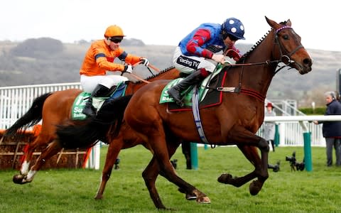 Paisley Park ridden by Aidan Coleman and Sam Spinner ridden by Joe Colliver - Credit: REUTERS/Eddie Keogh