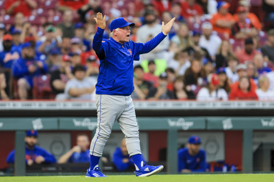 New York Mets' Buck Showalter yells on the field after being ejected by MLB umpire Mark Wegner during the fifth inning of a baseball game against the Cincinnati Reds in Cincinnati, Tuesday, May 9, 2023. (AP Photo/Aaron Doster)