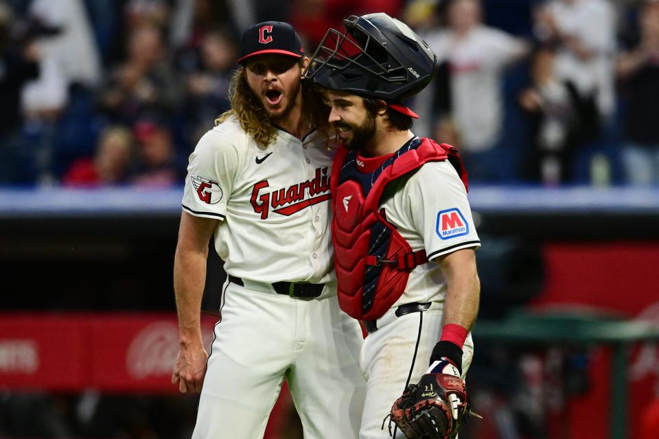 Guardians relief pitcher Scott Barlow and catcher Austin Hedges celebrate after beating the Angels, May 4, 2024, in Cleveland.