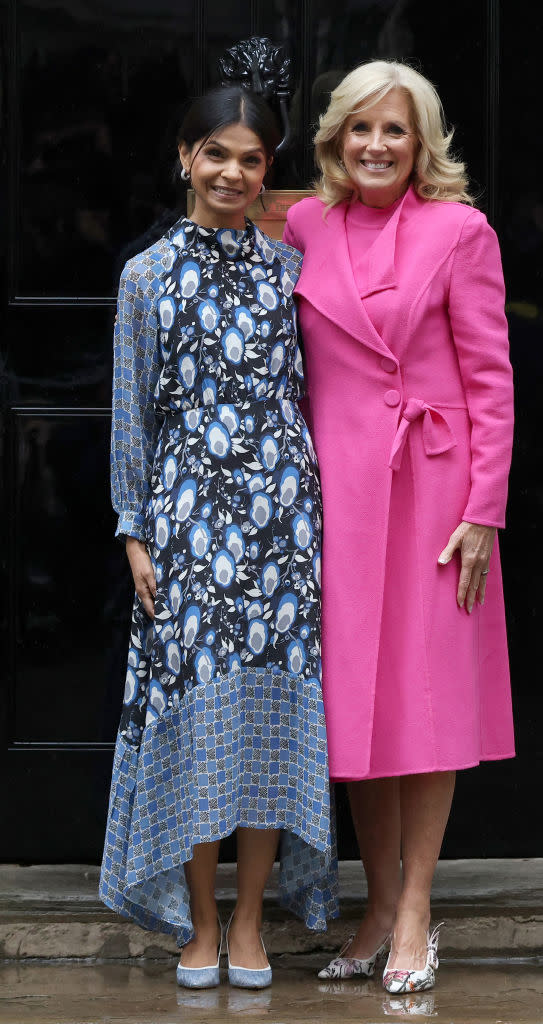 jill biden pink coat dress, LONDON, ENGLAND - MAY 05: First Lady Jill Biden of the United States meets Akshata Murty, wife of British Prime Minister Rishi Sunak at number 10 Downing Street on May 5, 2023 in London, England. A series of foreign dignitaries are visiting Downing Street while in town for the coronation of King Charles III. (Photo by Hollie Adams/Getty Images)