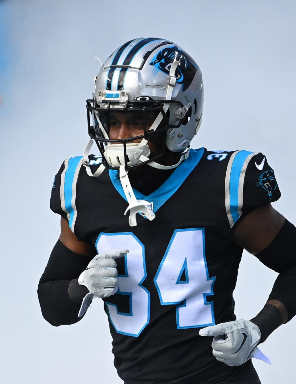 Carolina Panthers safety Sean Chandler (34) runs onto the field at Bank of America Stadium in Charlotte on Nov. 27, 2022.