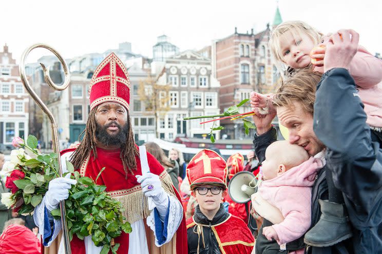 Dutch actor Patrick Mathurin has protested Zwarte Piete. Here he's dressed as Sinterklaas (Santa Claus) in Amsterdam November 5, 2016. (Photo by Romy Arroyo Fernandez/NurPhoto via Getty Images)