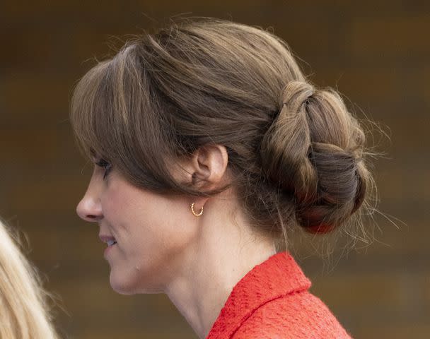 <p>Mark Cuthbert/UK Press via Getty</p> Kate Middleton's new bangs are seen on Sept. 27, 2023