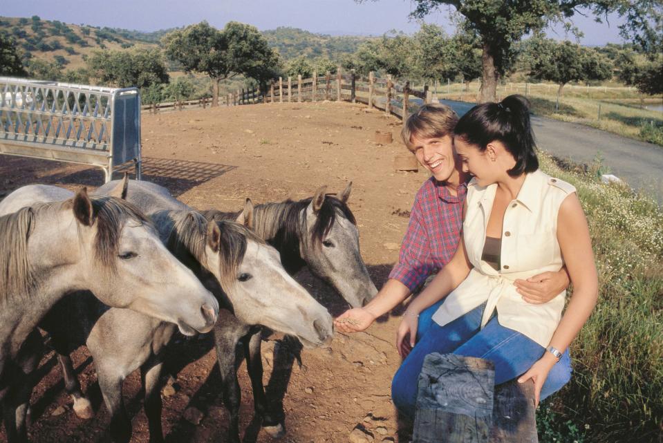 Manuel Diaz ´El Cordobes´ and his wife Vicky Berrocal in the country Feeding their horses in his property ´El cerro negro´  (Photo by Luis Davilla/Cover/Getty Images)