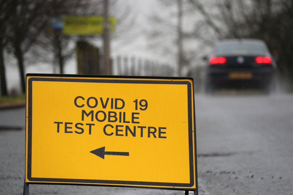 A general view of a Covid-19 mobile test centre sign at the entrance to Bannockburn High School near Stirling. Scotland is currently using a tier system to try and drive down coronavirus cases.