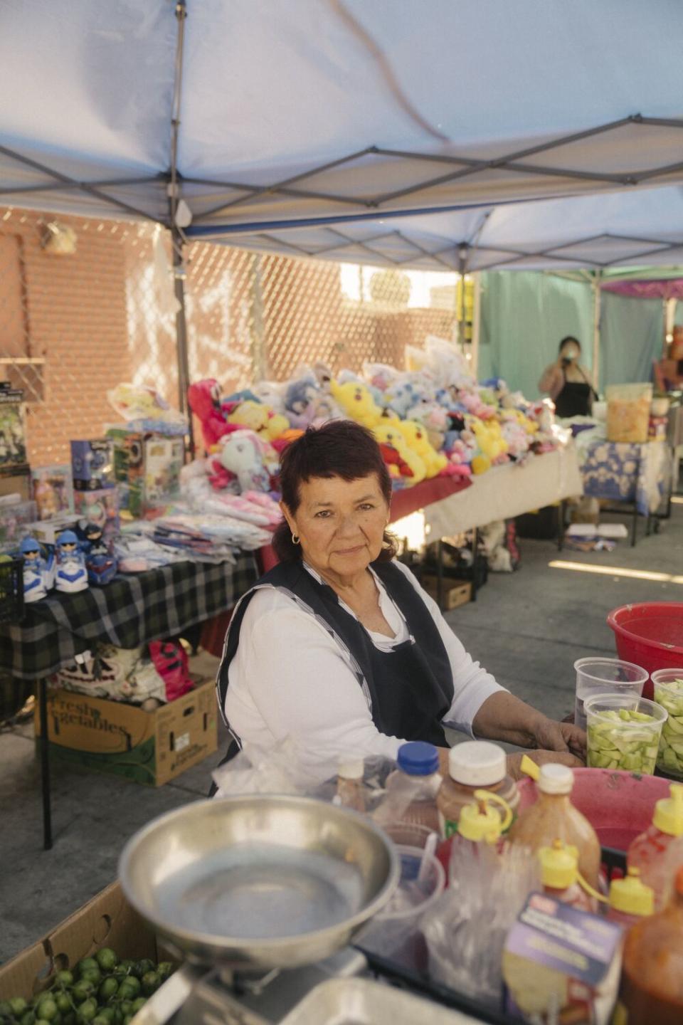 Ana Sanabria, who owns a coctel de conchas and fruit stand.