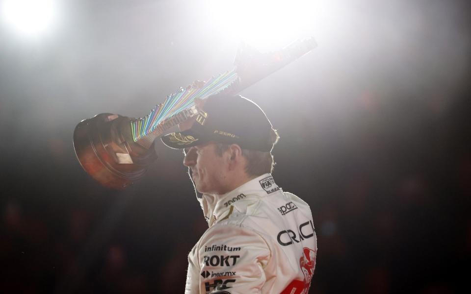 Race winner Max Verstappen of the Netherlands and Oracle Red Bull Racing celebrates on the podium during the F1 Grand Prix of Las Vegas at Las Vegas Strip Circuit on November 18, 2023 in Las Vegas, Nevada