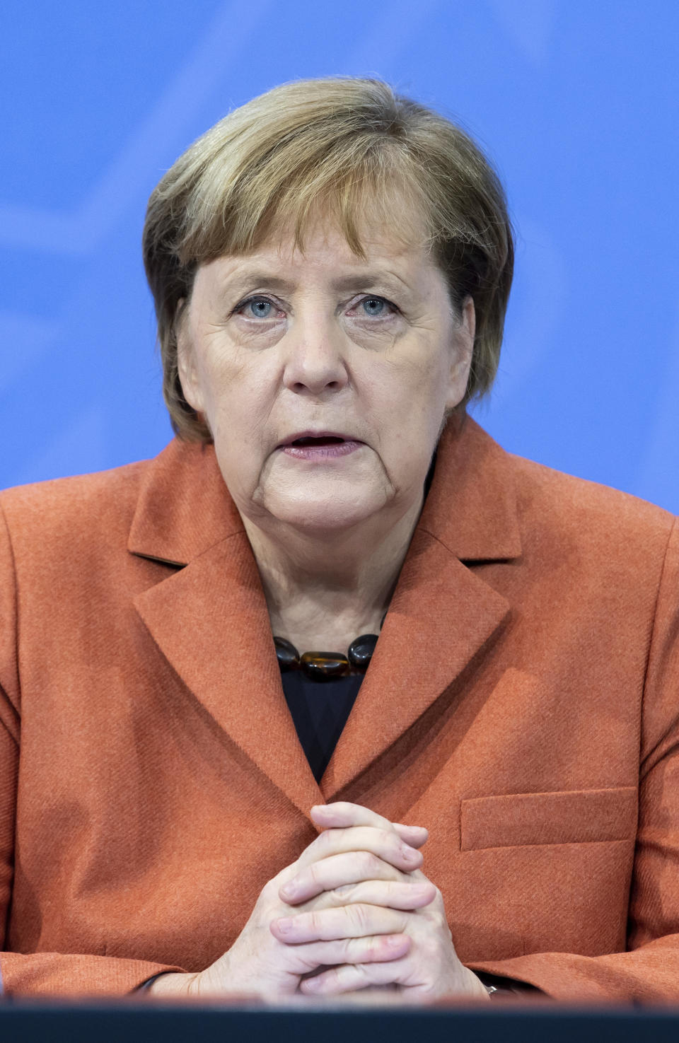 After the switching conference between her and the prime ministers of the federal states, Chancellor Angela Merkel (CDU) comments on the further procedure in the Corona crisis at a press conference in the Federal Chancellery, on Sunday, Dec.13, 2012. (Bernd von Jutrczenka/Pool via AP)