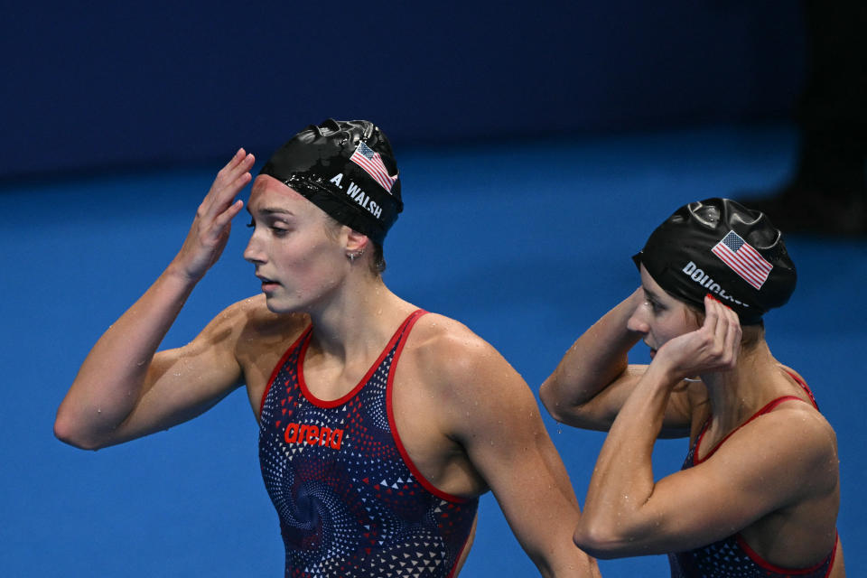 US' Alex Walsh (L) reacts next to US' Kate Douglass after being disqualified in the final of the women's 200m individual medley swimming event during the Paris 2024 Olympic Games at the Paris La Defense Arena in Nanterre, west of Paris, on August 3, 2024. (Photo by Oli SCARFF / AFP) (Photo by OLI SCARFF/AFP via Getty Images)