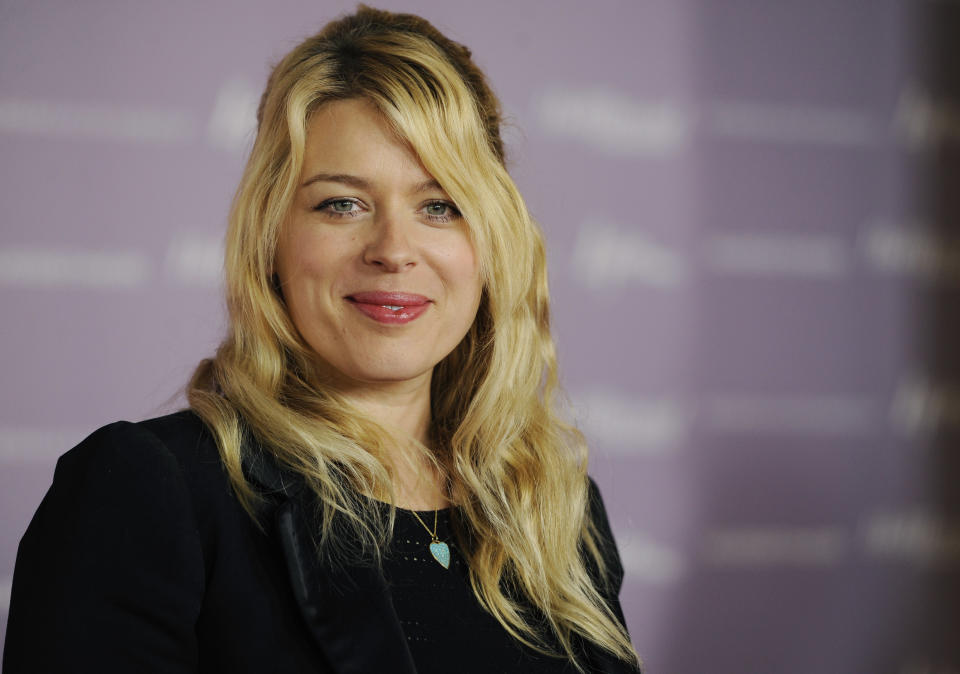 Amanda De Cadanet poses at The Hollywood Reporter's 20th annual Women in Entertainment Breakfast in Beverly Hills, Calif., Wednesday, Dec. 7, 2011. The event celebrated the 100 most powerful women in the entertainment industry. (AP Photo/Chris Pizzello)