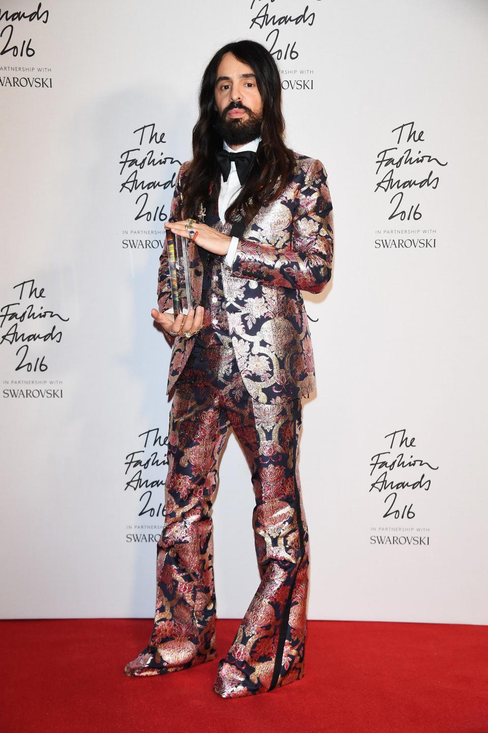 Gucci Creative Director Alessandro Michele in the Winners Room with his award for best International Accessories Designer at the British Fashion Awards 2016 on December 5, 2016 in London, England. (Photo by Venturelli/Getty Images for GUCCI)
