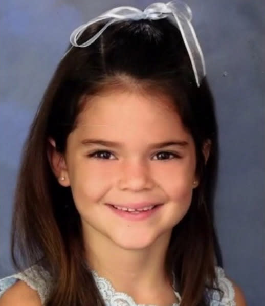 <p>The second-youngest Jenner already knew how to charm the camera in her school photos with a white ribbon tied in her hair. <i>(Photo: <a href="https://instagram.com/p/vGcZgujo6C/" rel="nofollow noopener" target="_blank" data-ylk="slk:Instagram;elm:context_link;itc:0;sec:content-canvas" class="link ">Instagram</a>)</i></p>