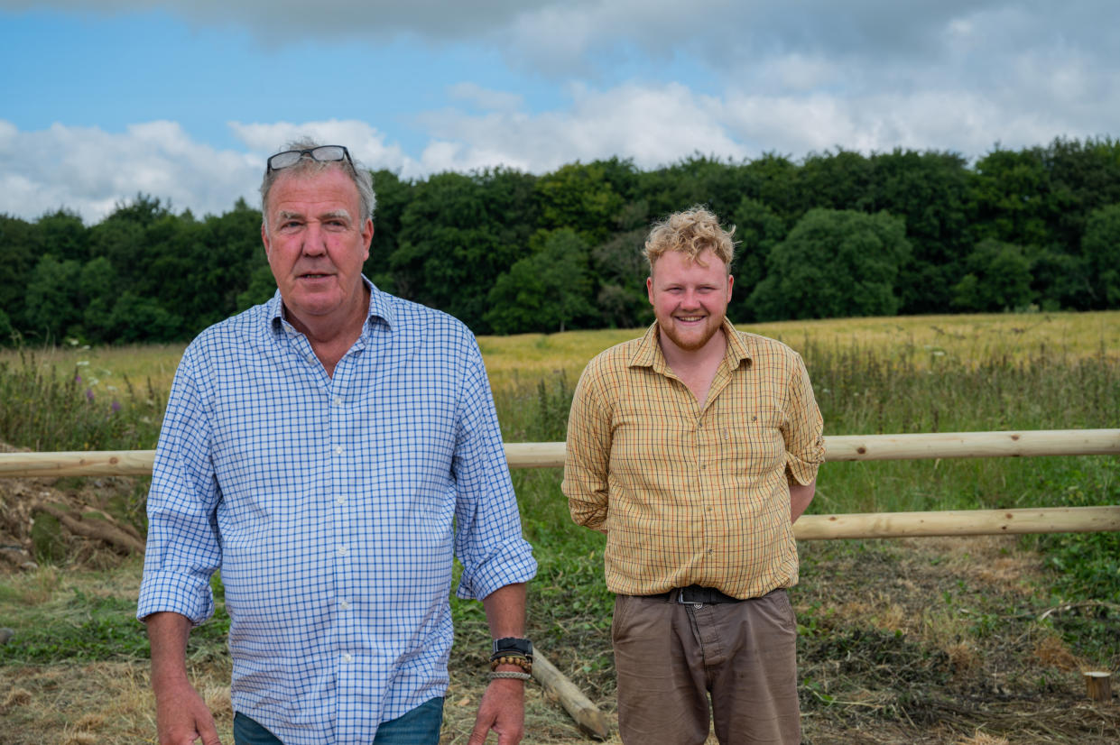 Jeremy Clarkson and Caleb Cooper standing in a field