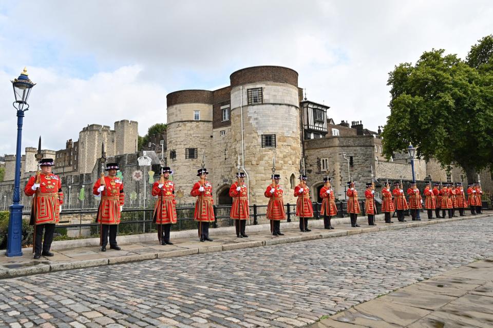 Members of the Honourable Artillery Company, British Army, arrive for the Death Gun Salute that will be fired at the Tower of London